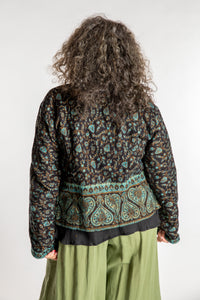Susan is wearing the M/L Malini Soft Brushed Cardigan in Blue