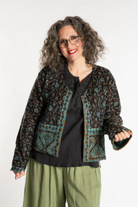 Susan is wearing the M/L Malini Soft Brushed Cardigan in Blue