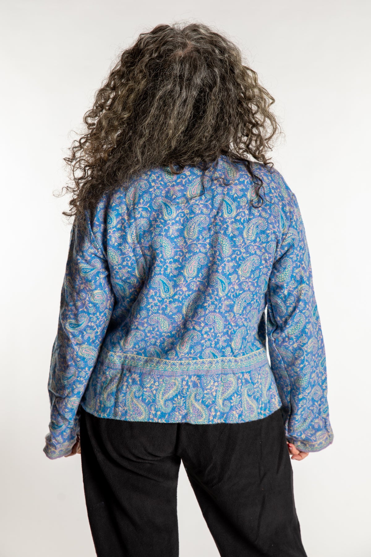 Susan is wearing the M/L Malini Soft Brushed Cardigan in Purple