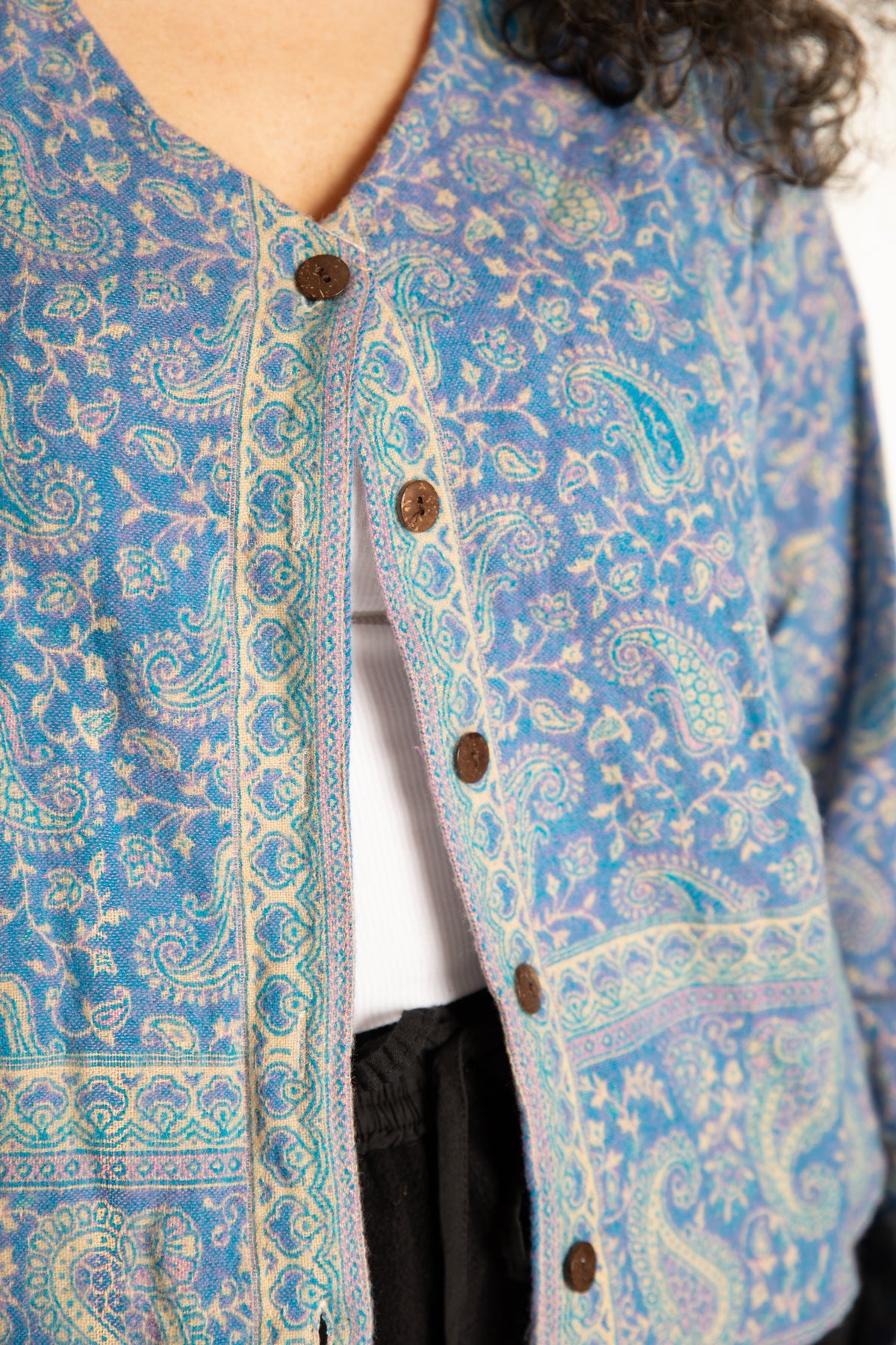Susan is wearing the M/L Malini Soft Brushed Cardigan in Purple