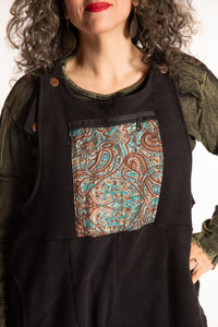 Susan is wearing the M/L Mexicali Fleece Overalls in Black