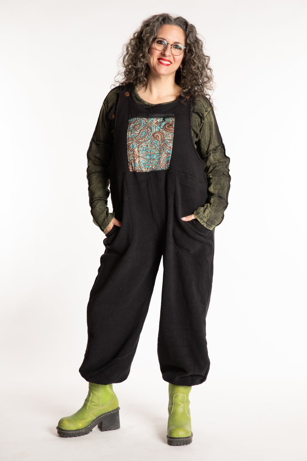 Susan is wearing the M/L Mexicali Fleece Overalls in Black