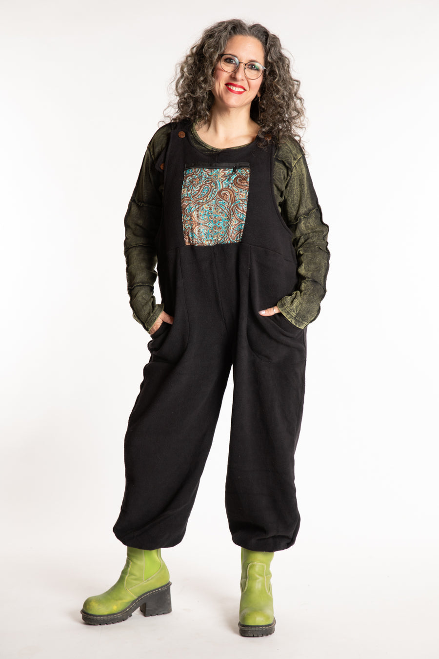 Susan is wearing the M/L Mexicali Fleece Overalls in Black