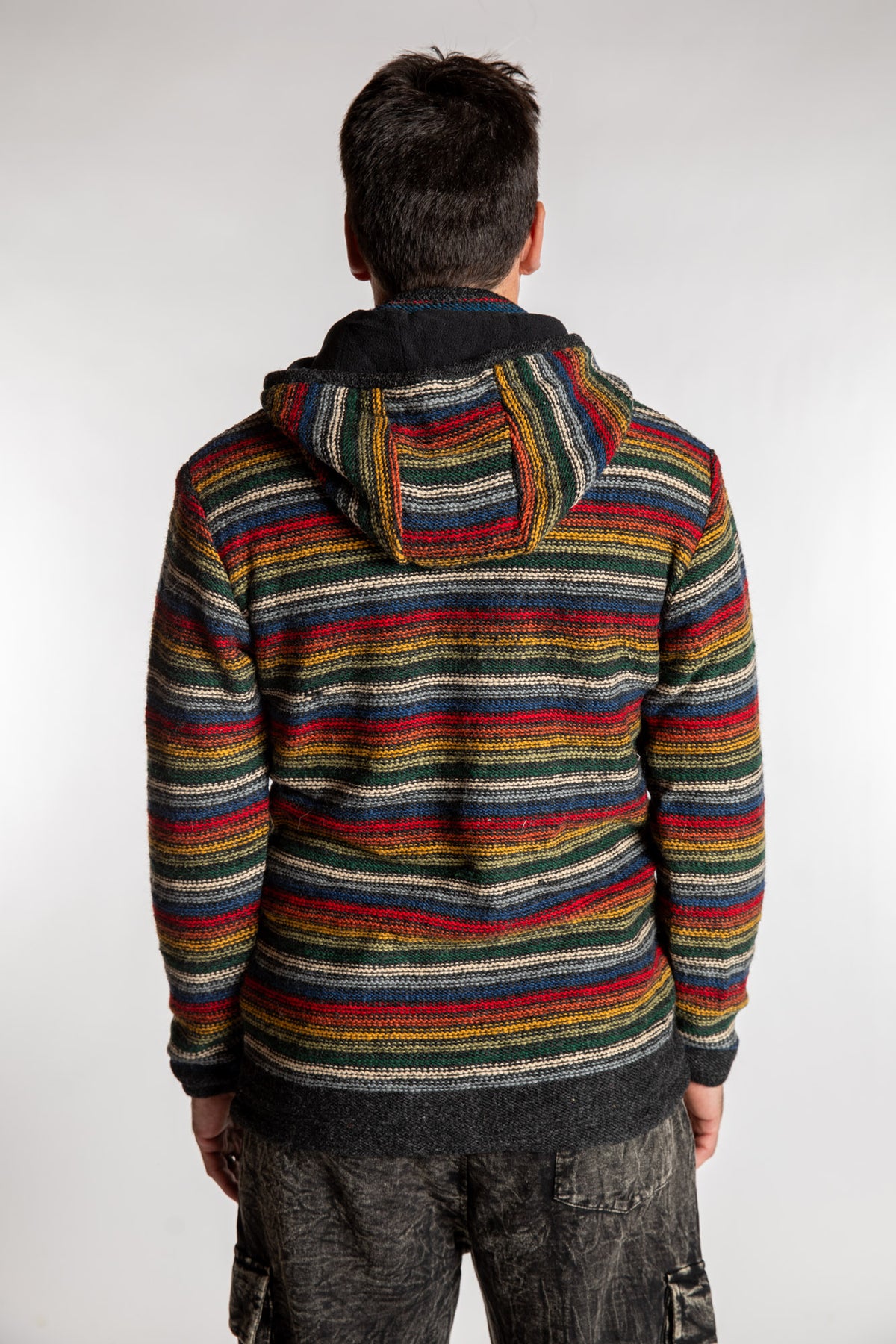 Topher is wearing the Large Mexicali Wool Hoodie Jacket in Multi Stripe