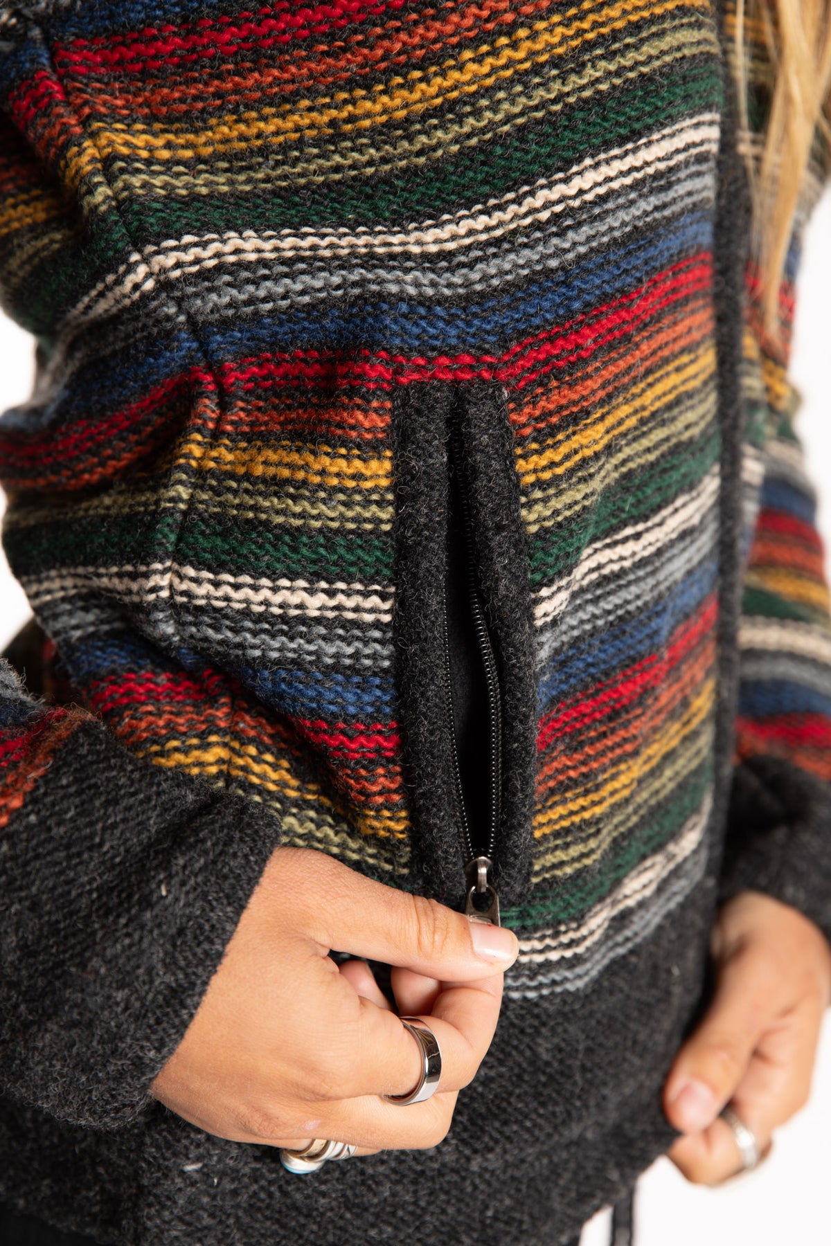 Sophie is wearing the Small Mexicali Patterned Wool Hoodie in Multi Stripe