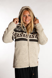 Sophie is wearing the Small Mexicali Patterned Wool Hoodie in Natural