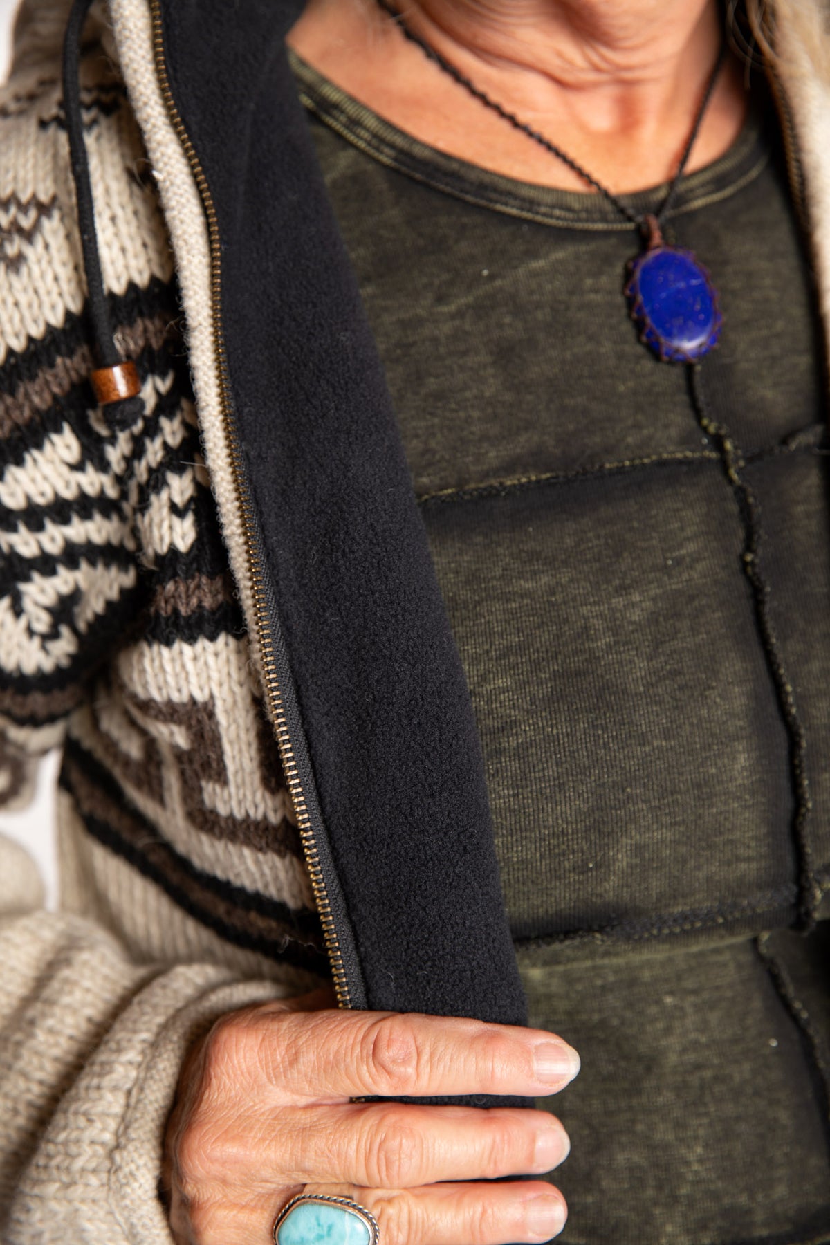Kim is wearing the Medium Mexicali Patterned Wool Hoodie in Natural