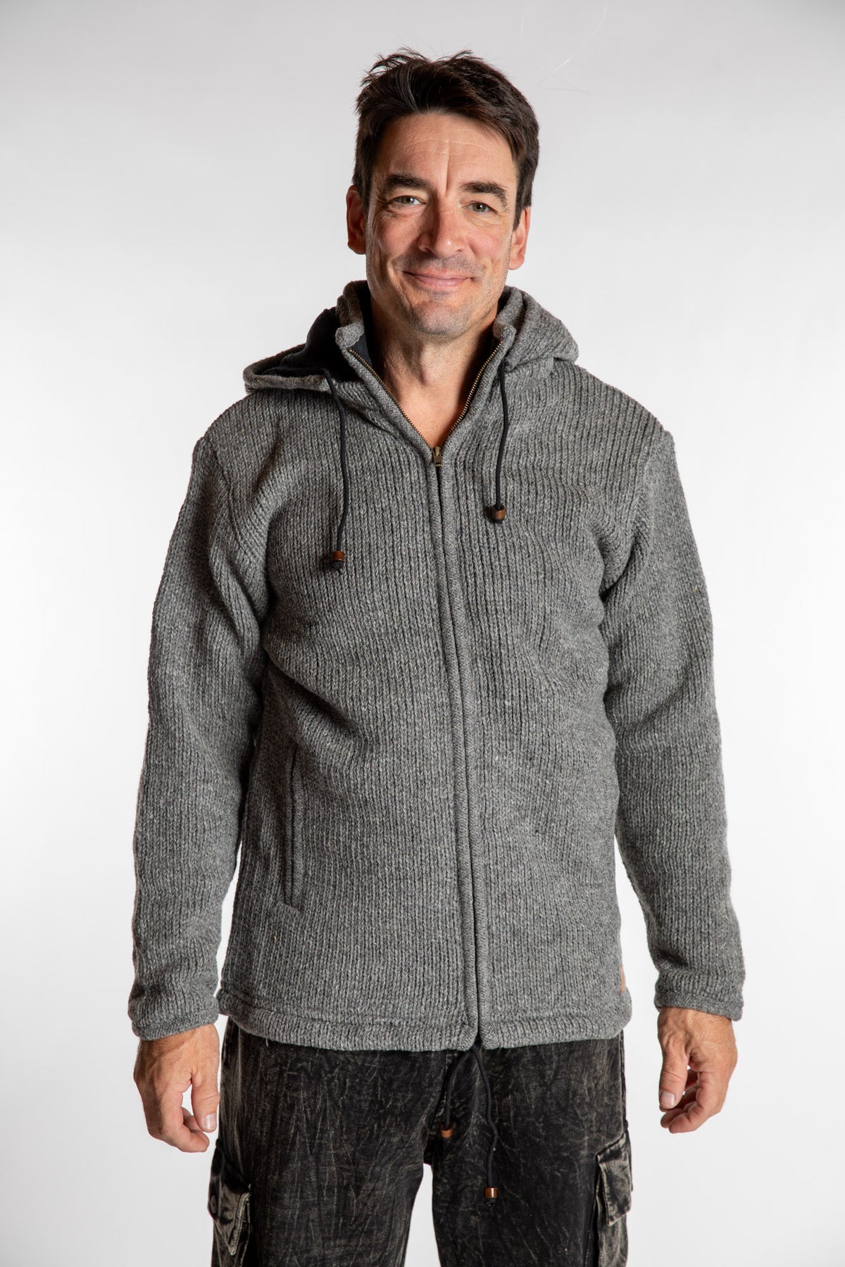 Topher is wearing the Large Mexicali Wool Hoodie Jacket in Gray