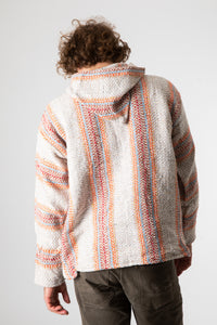 Ryan is wearing size L baja hoodie in cayenne