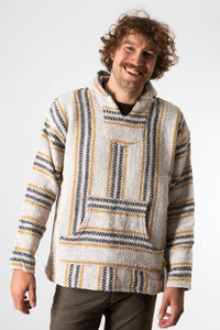 Ryan is wearing size L baja hoodie in mustard