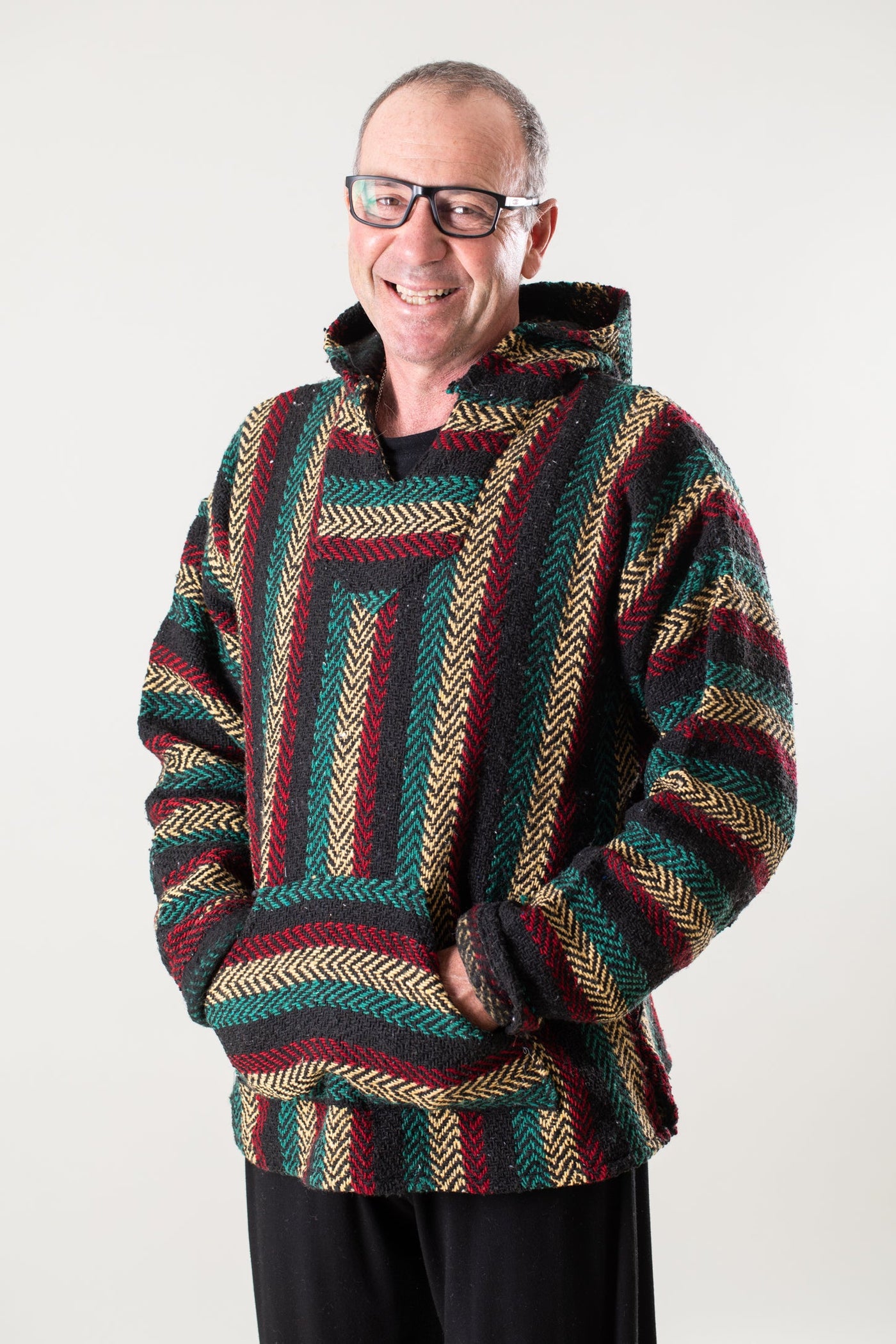 Ross is wearing size L baja hoodie in rasta