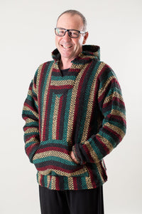 Ross is wearing size L baja hoodie in rasta