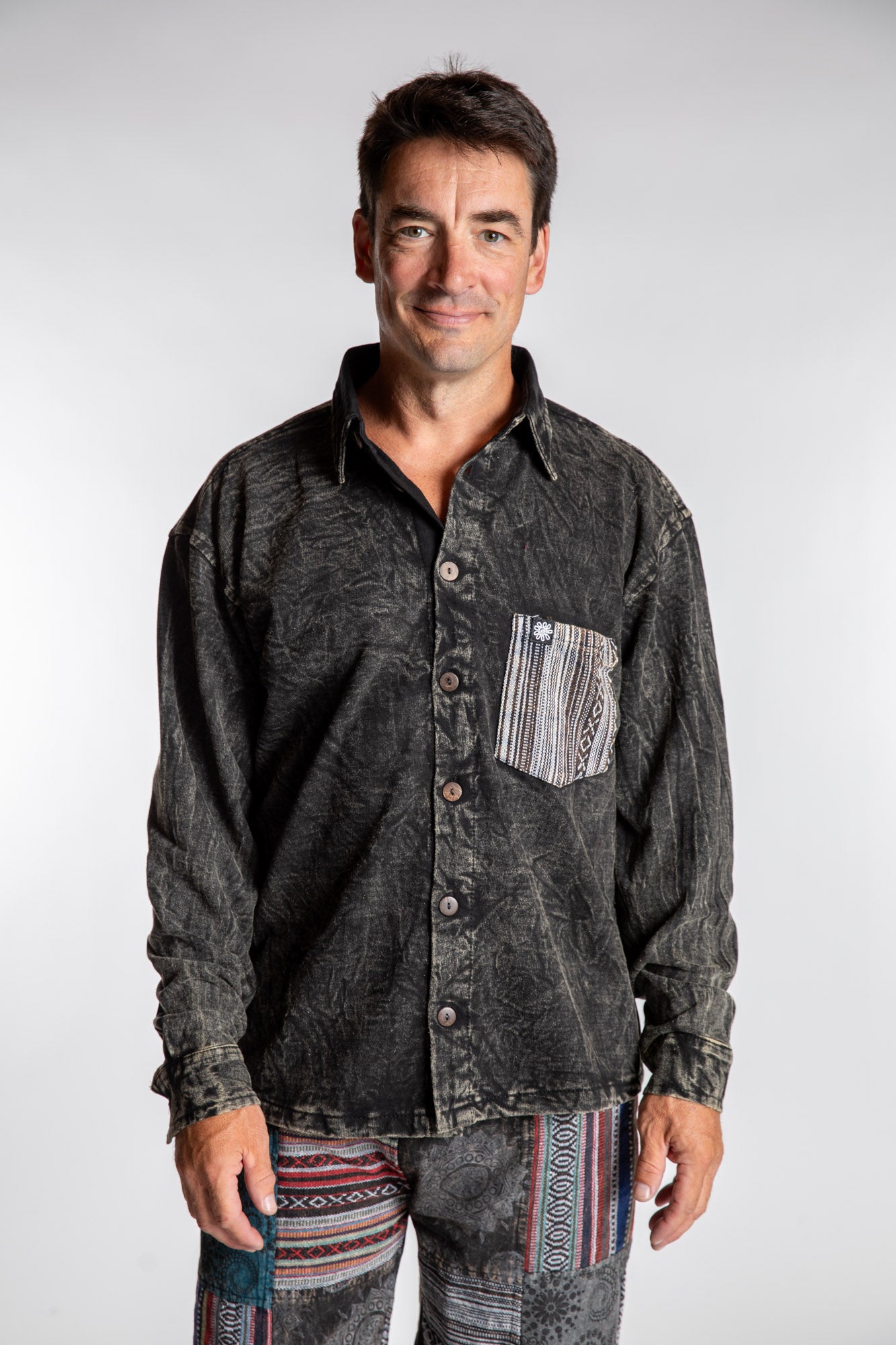 Topher is wearing the Black Niran Shirt Jacket in L/XL