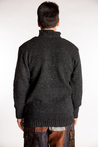 Topher is wearing the Large Nordic Quarter Zip Wool Sweater in Charcoal
