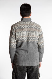 Topher is wearing the Large Nordic Quarter Zip Wool Sweater in Light Gray Pattern