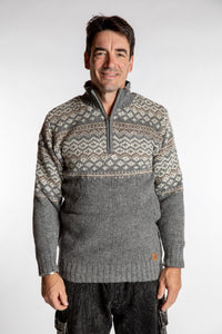 Topher is wearing the Large Nordic Quarter Zip Wool Sweater in Light Gray Pattern