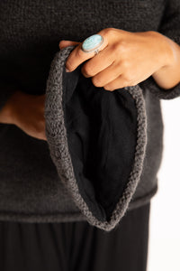 Sophie is wearing the North Country Patterned Wool Pom Bean in Red