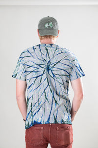 Chauncey is wearing size L oracle tie dye t shirt in indigo and gray