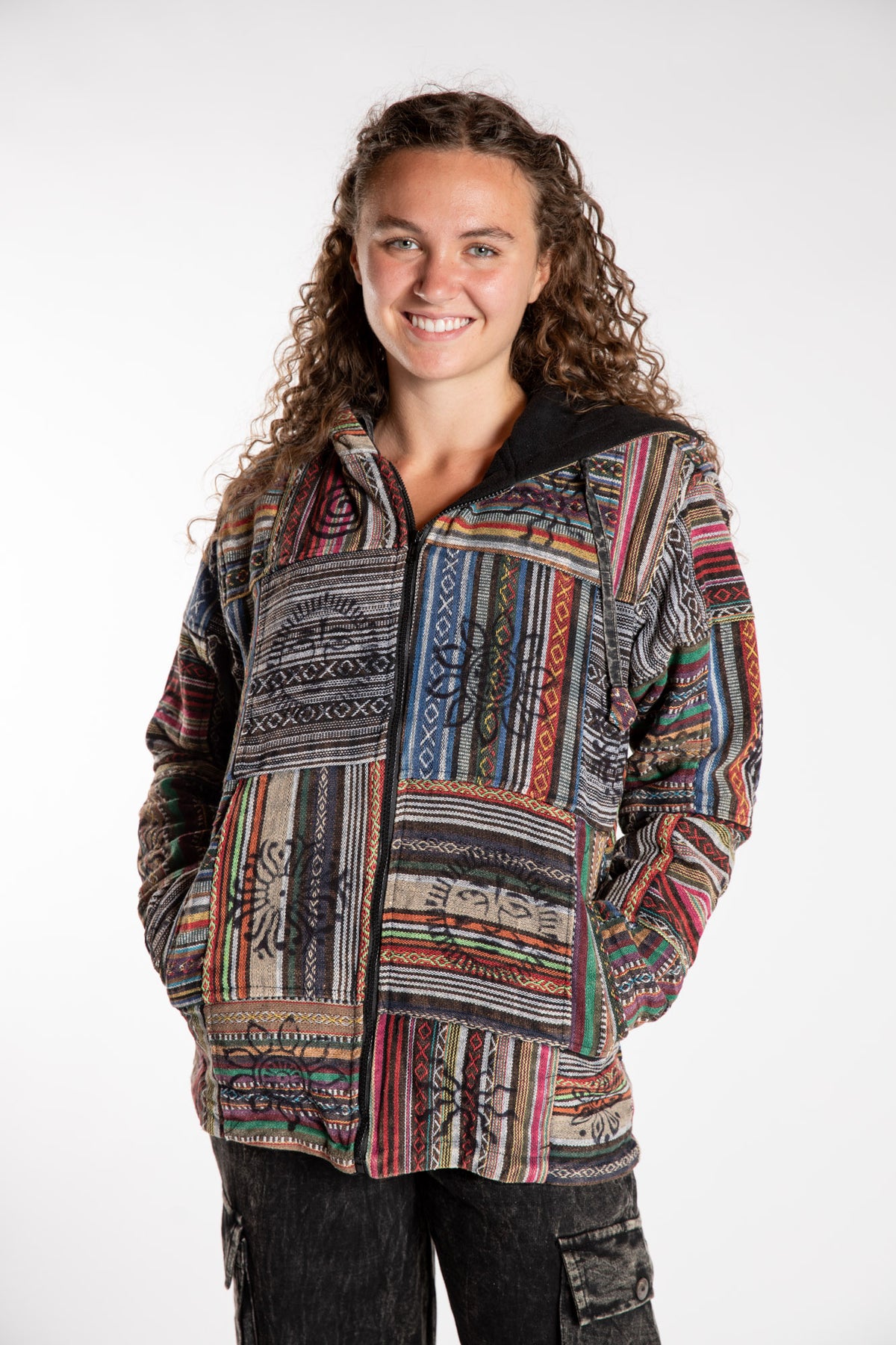 Emily is wearing the Black Pahadi Patchwork Jacket in S/M