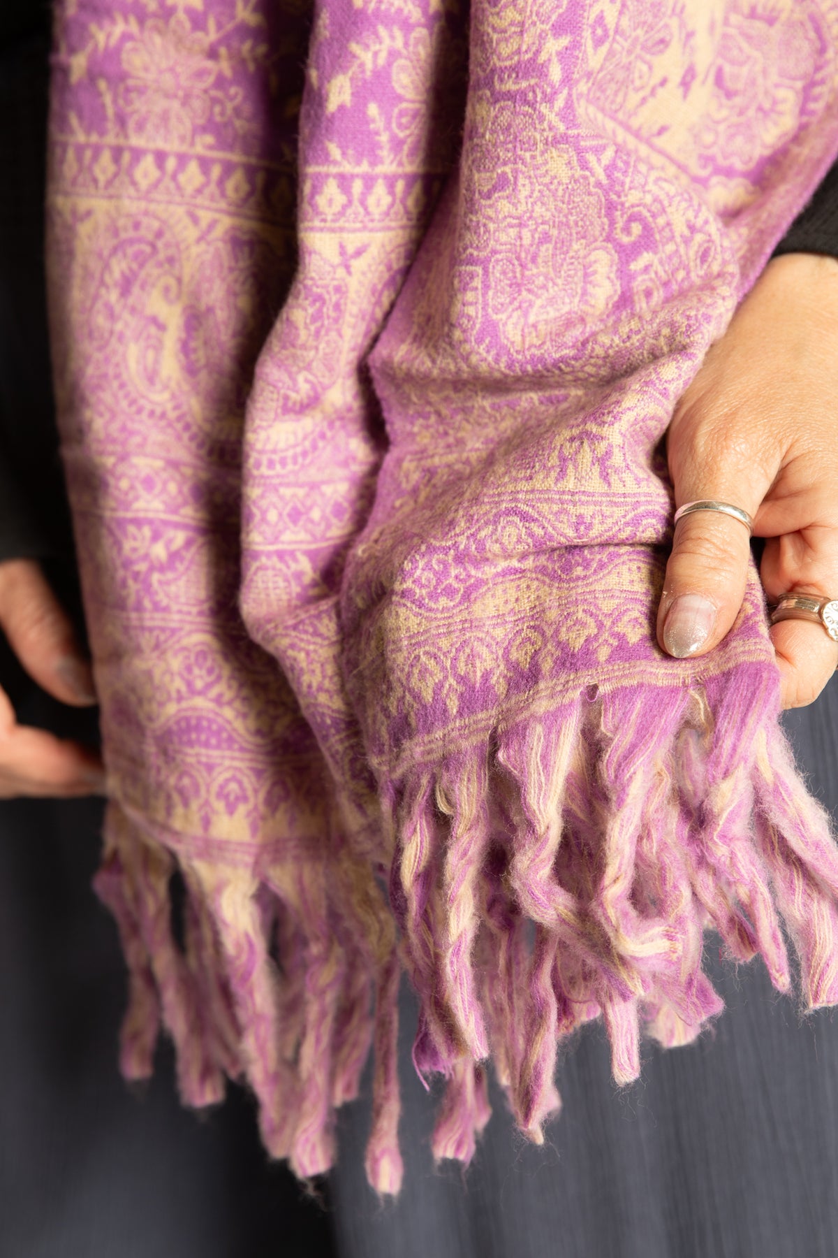 Susan is wearing the Paisley Soft Brushed Shawl in Lavender