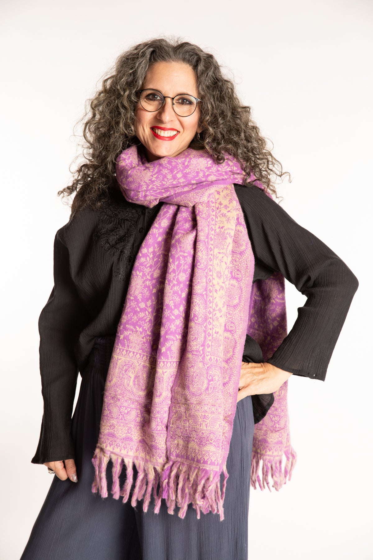 Susan is wearing the Paisley Soft Brushed Shawl in Lavender