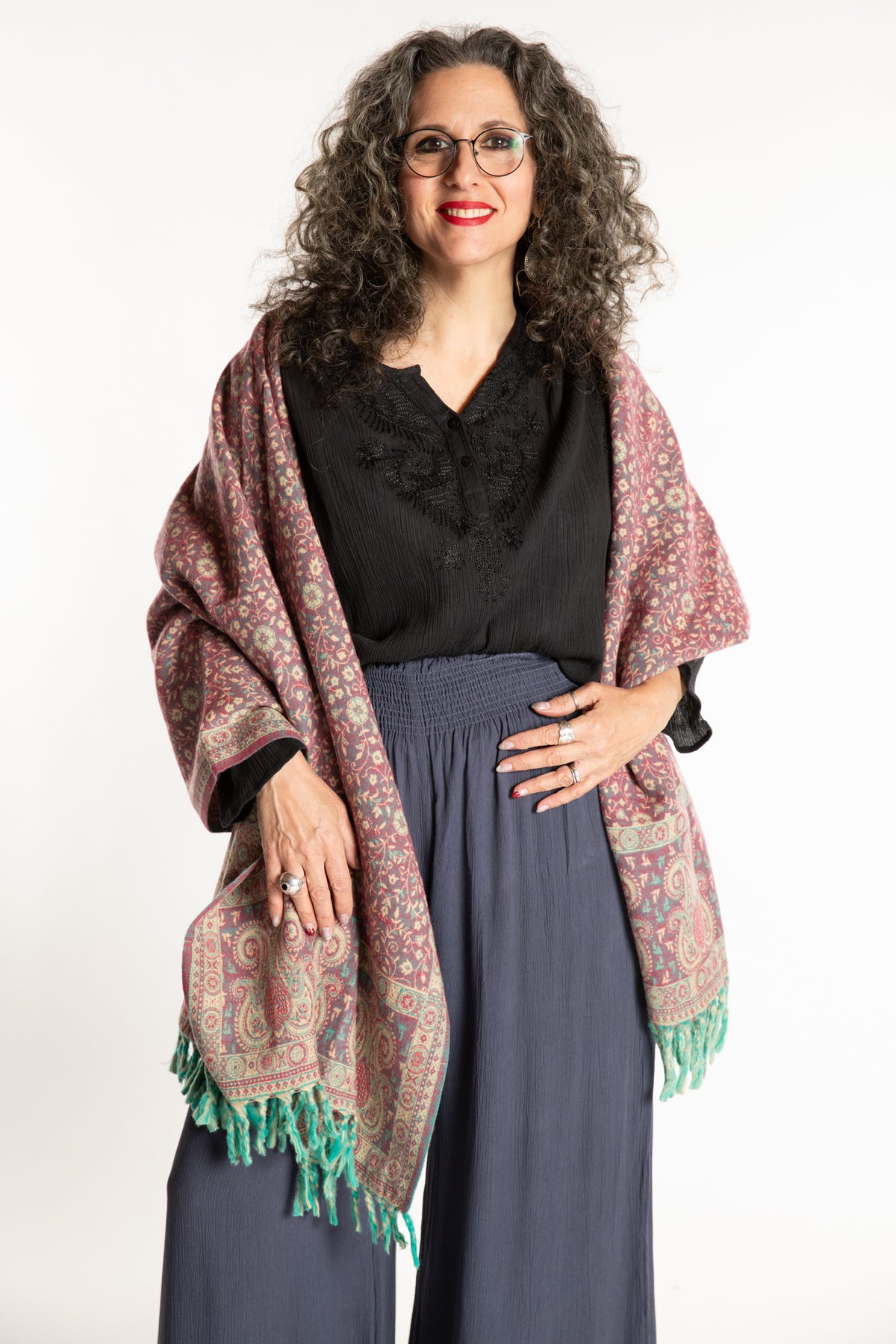 Susan is wearing the Paisley Soft Brushed Shawl in Rose