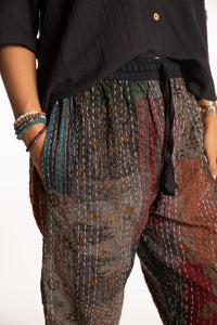 Sophie is wearing the Black Patchwork Kantha Pants in size small