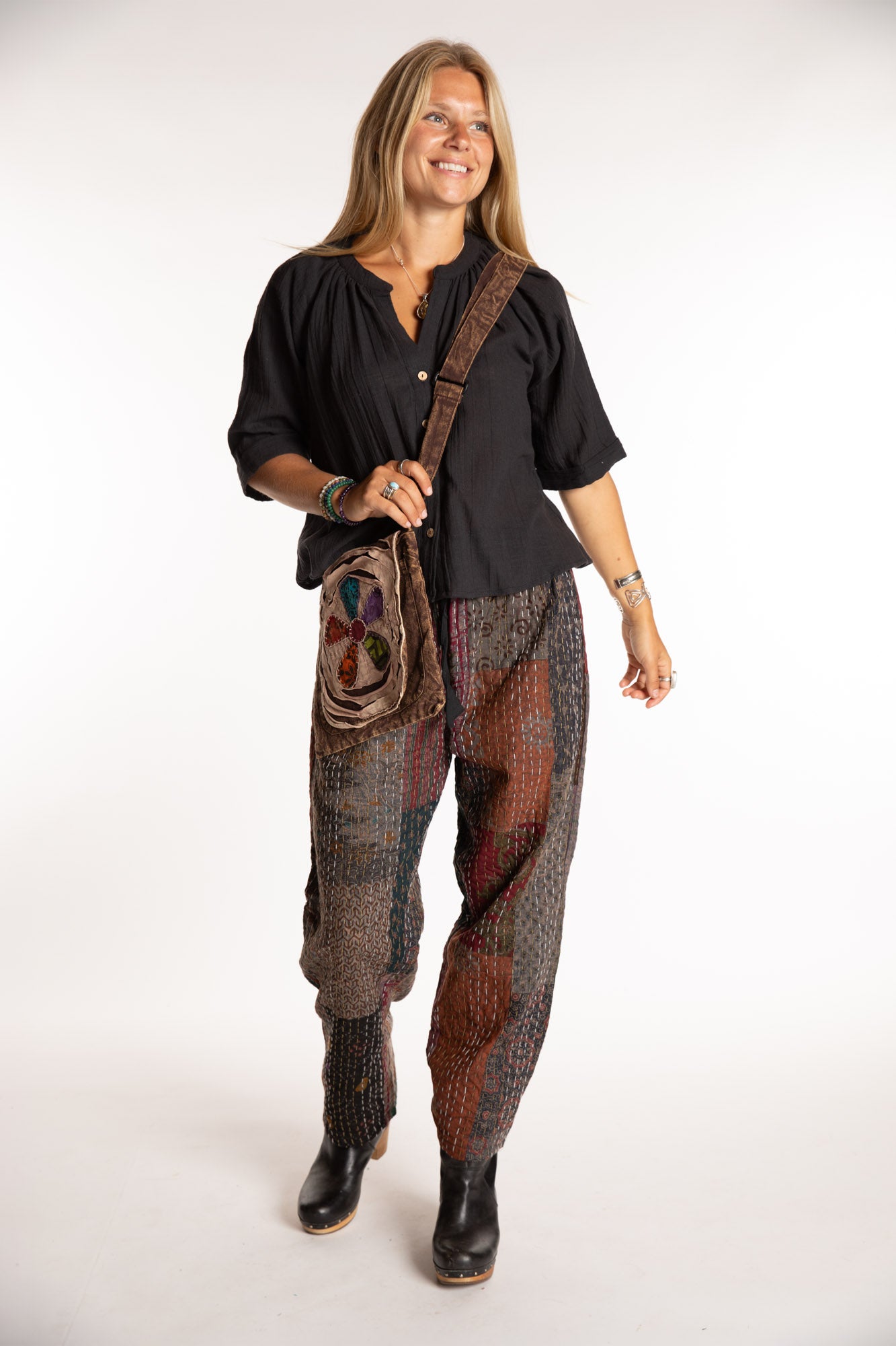 Sophie is wearing the Black Patchwork Kantha Pants in size small
