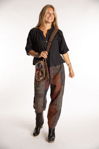 Sophie is wearing the Black Patchwork Kantha Pants in size small