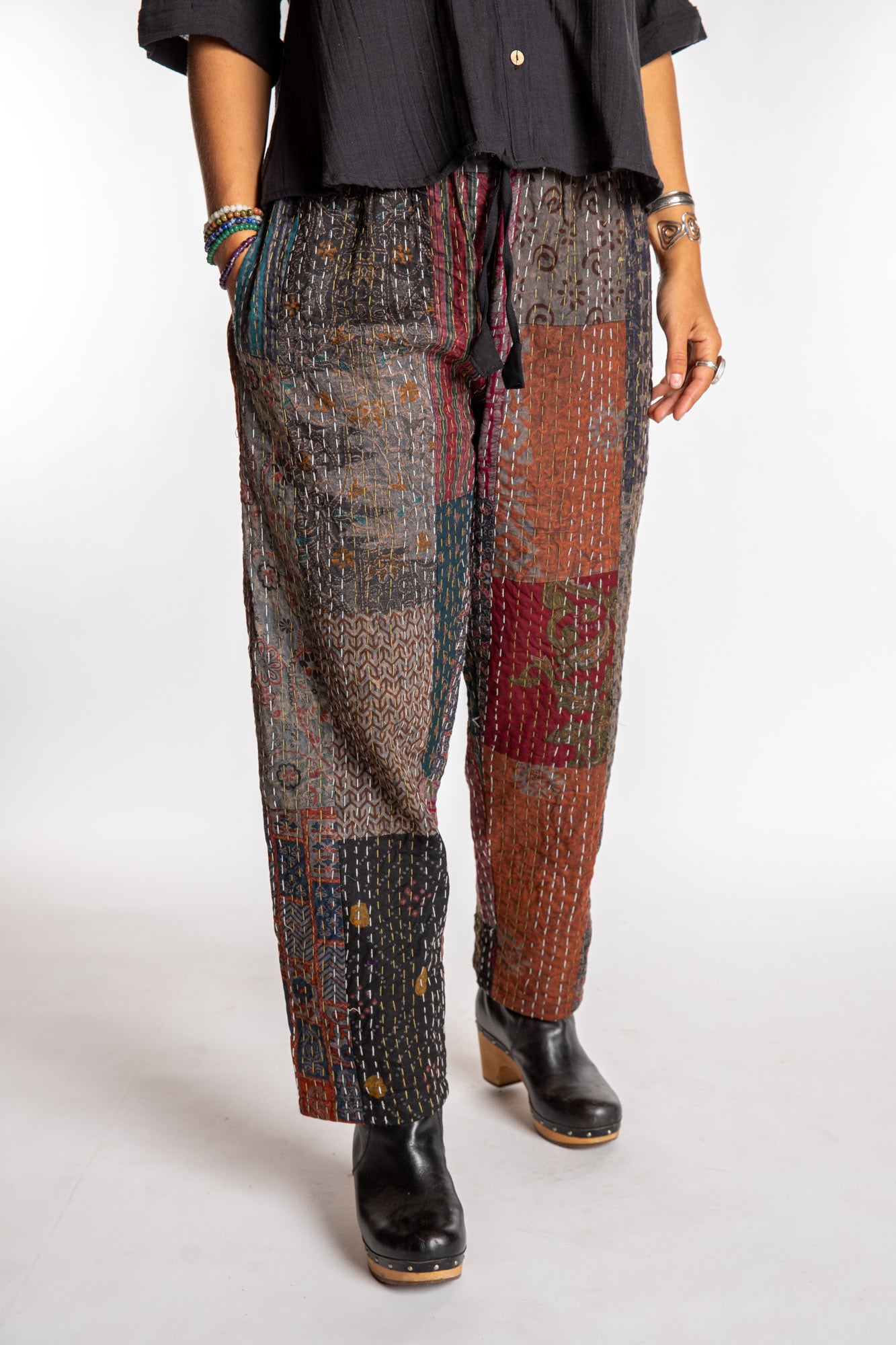 Sophie is wearing the Black Patchwork Kantha Pants in size small