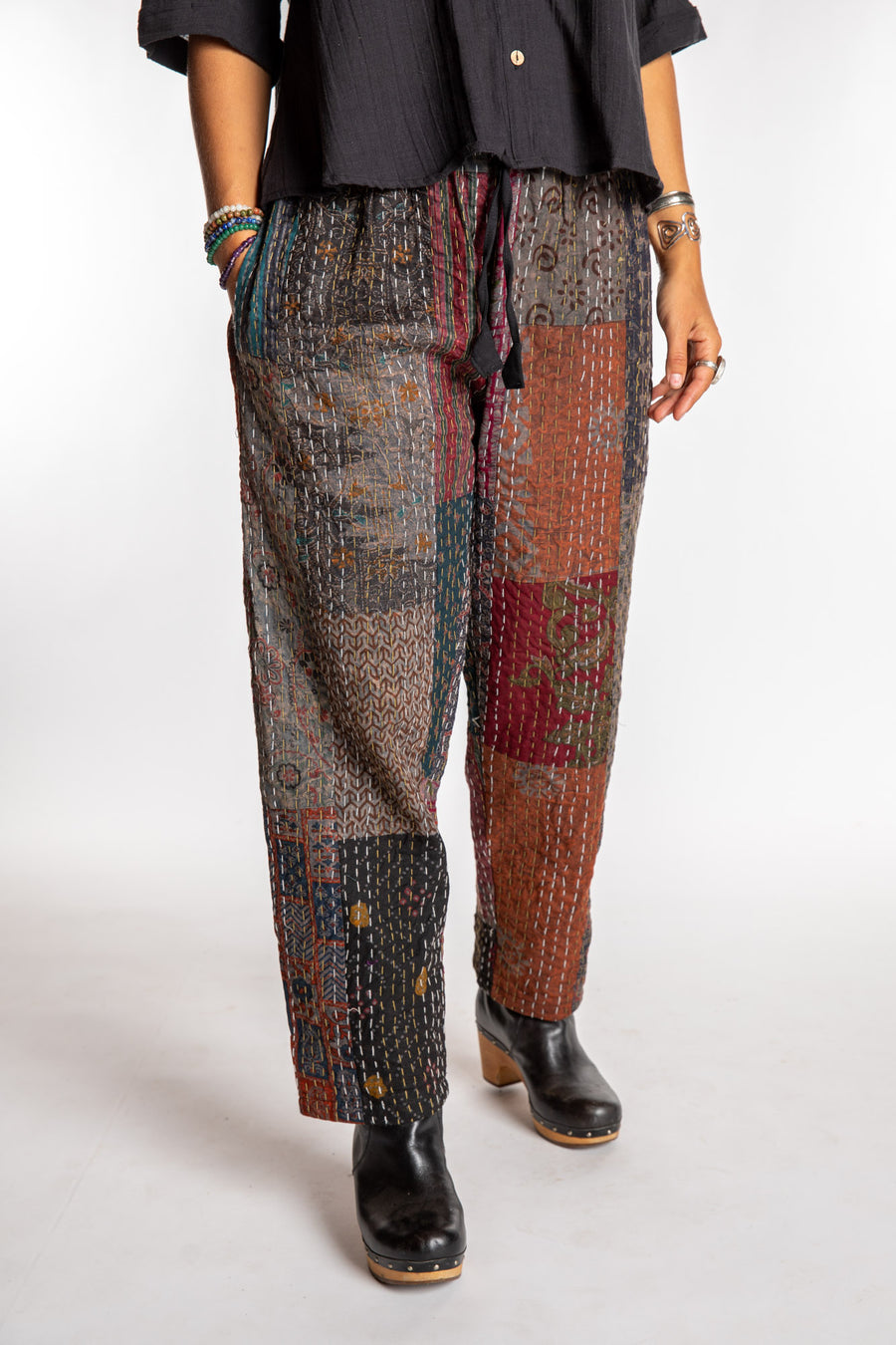 Sophie is wearing the Black Patchwork Kantha Pants in size small