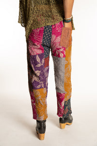 Sophie is wearing the Brown Patchwork Kantha Pants in size small