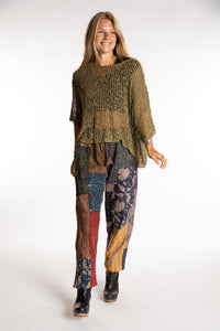 Sophie is wearing the Brown Patchwork Kantha Pants in size small