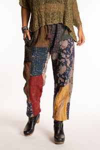 Sophie is wearing the Brown Patchwork Kantha Pants in size small