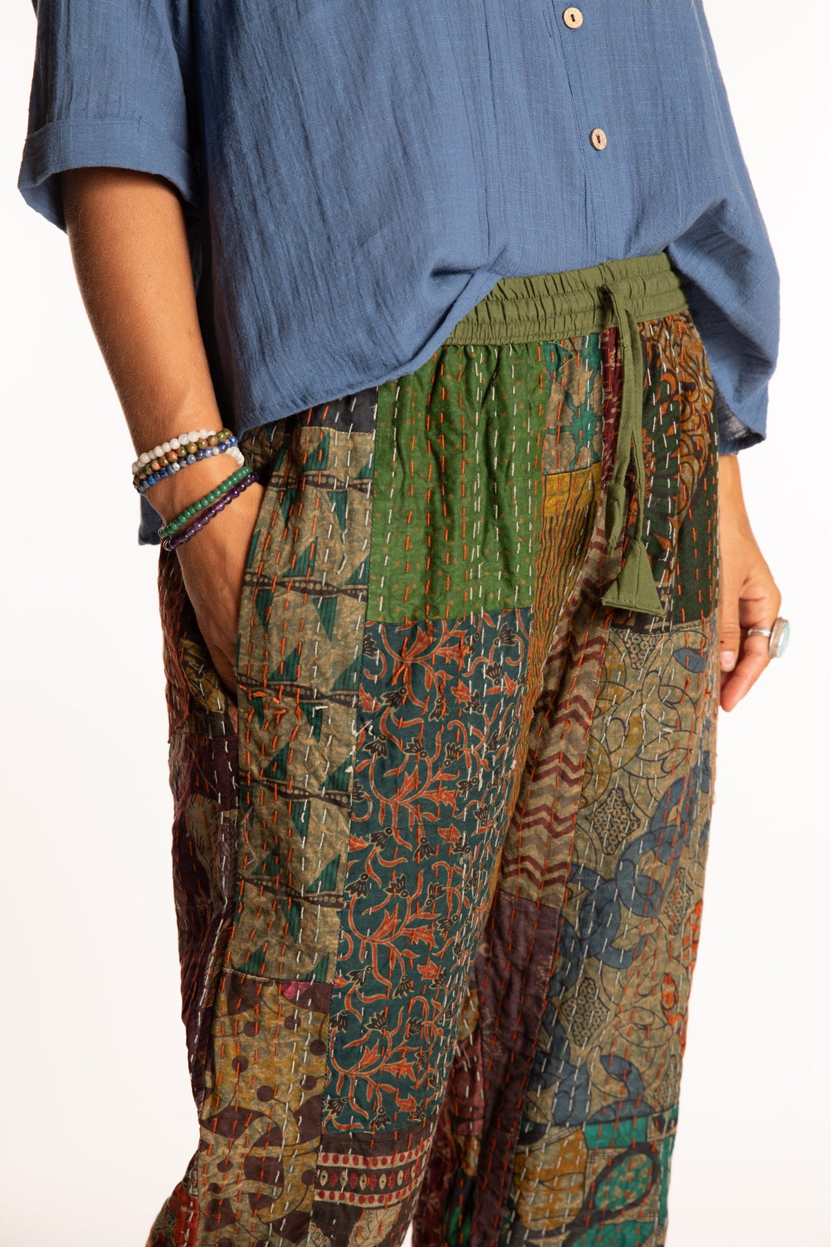 Sophie is wearing the Green Patchwork Kantha Pants in size small