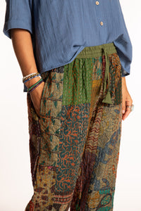 Sophie is wearing the Green Patchwork Kantha Pants in size small