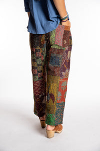 Sophie is wearing the Green Patchwork Kantha Pants in size small