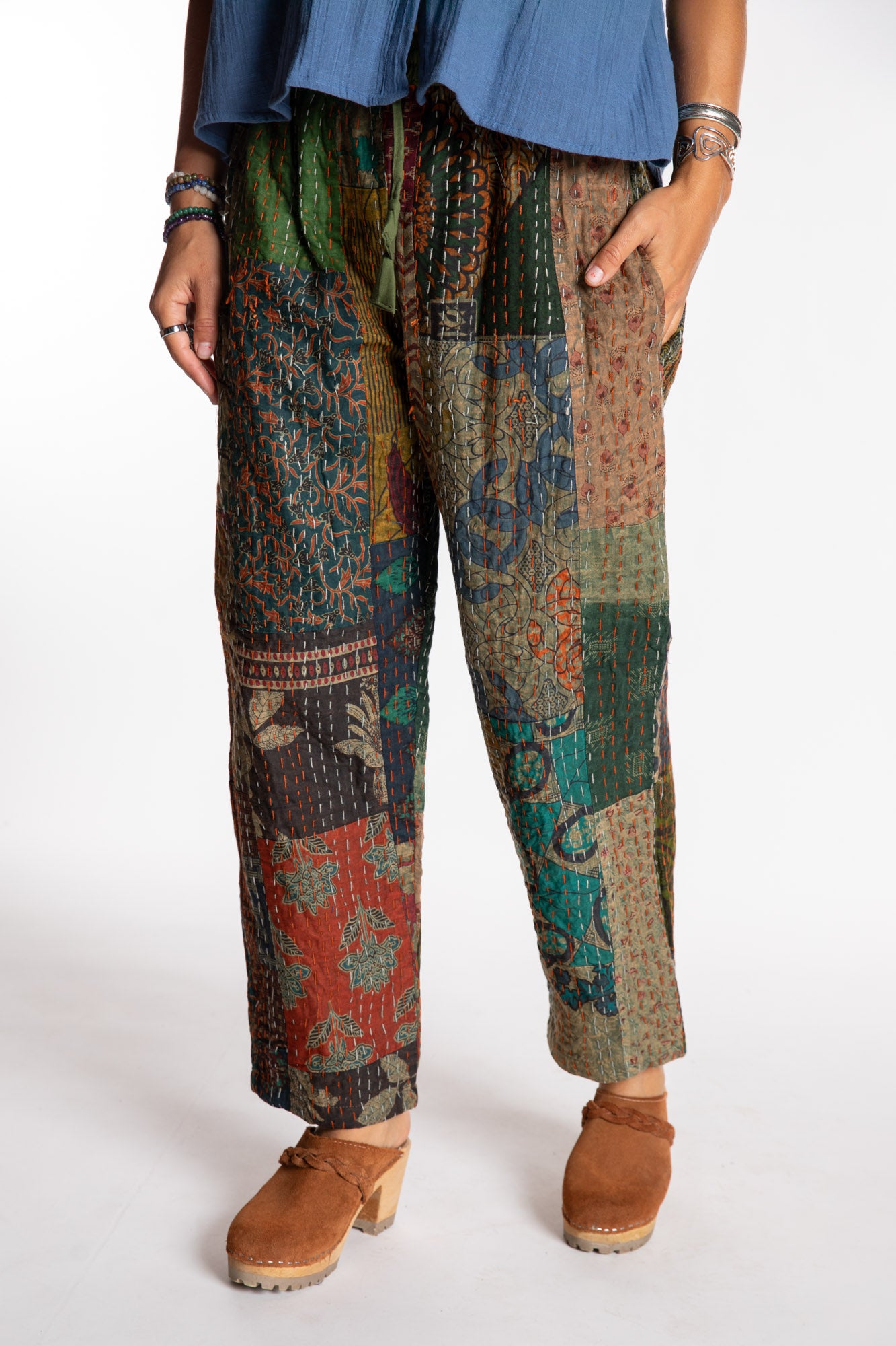 Sophie is wearing the Green Patchwork Kantha Pants in size small