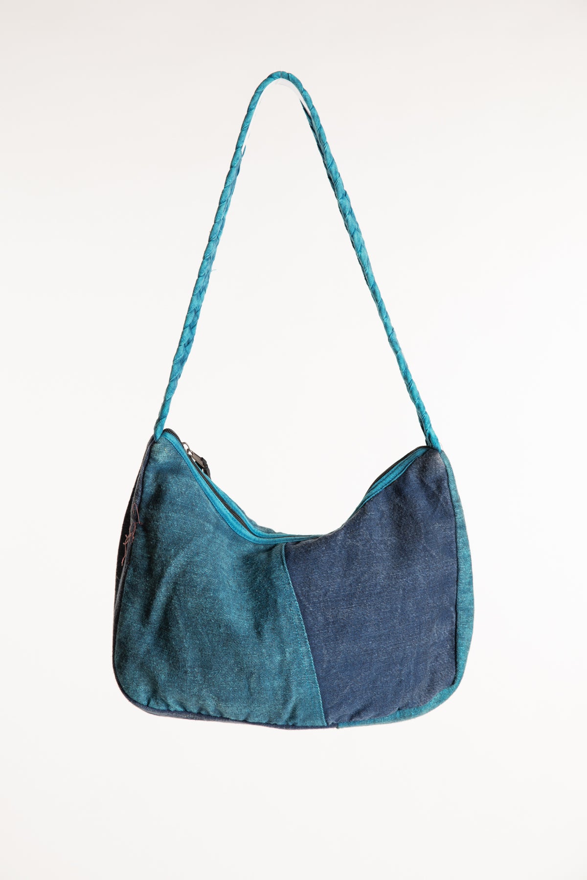 Back of blue and teal patchwork cotton shoulder bag 