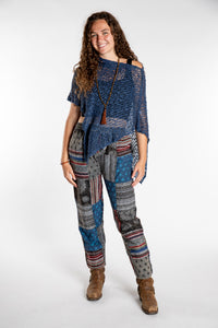 Emily is wearing the Black Patchwork Stone Wash Meditation Pants in Small
