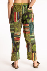 Emily is wearing the Green Patchwork Stone Wash Meditation Pants in Small
