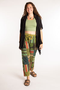 Emily is wearing the Green Patchwork Stone Wash Meditation Pants in Small