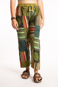 Emily is wearing the Green Patchwork Stone Wash Meditation Pants in Small