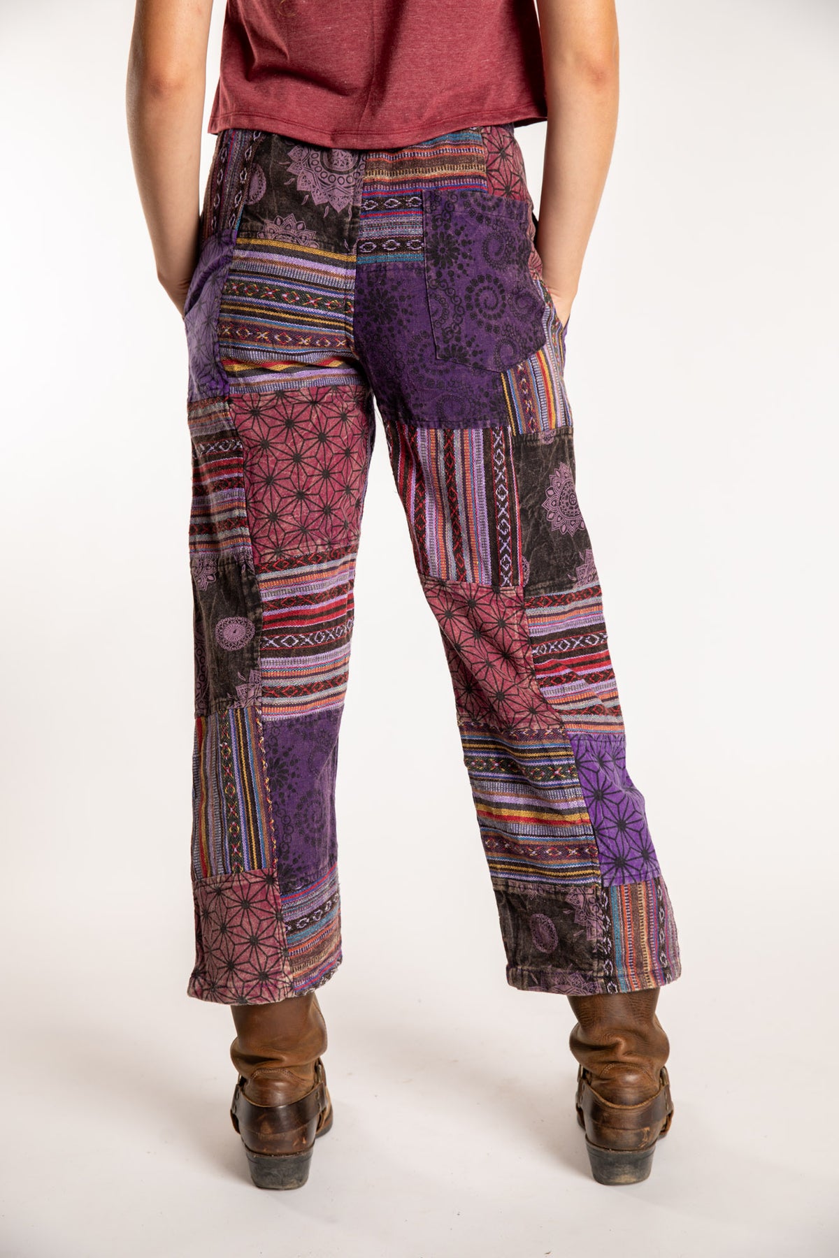 Emily is wearing the Purple Patchwork Stone Wash Meditation Pants in Small
