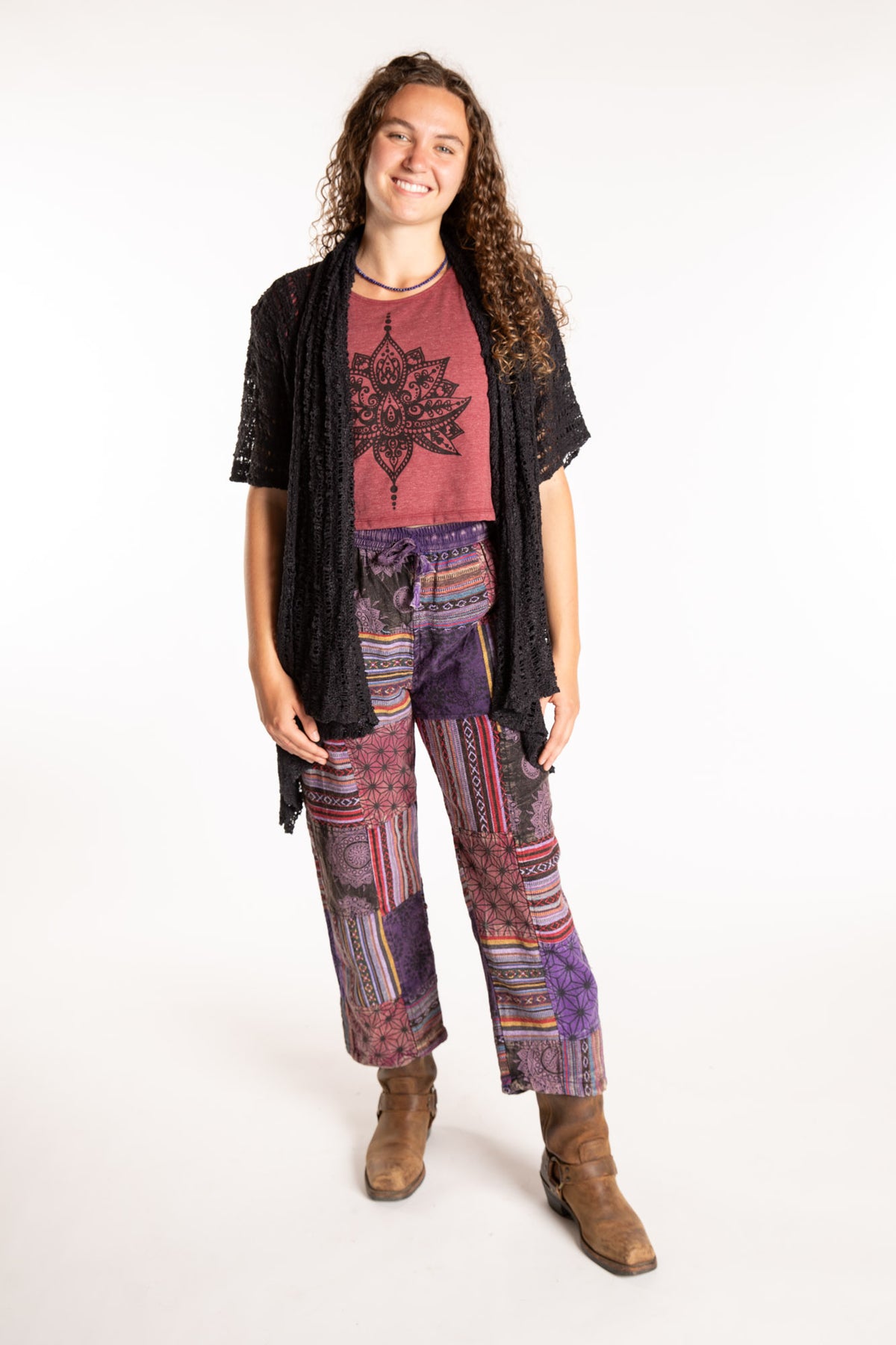 Emily is wearing the Purple Patchwork Stone Wash Meditation Pants in Small