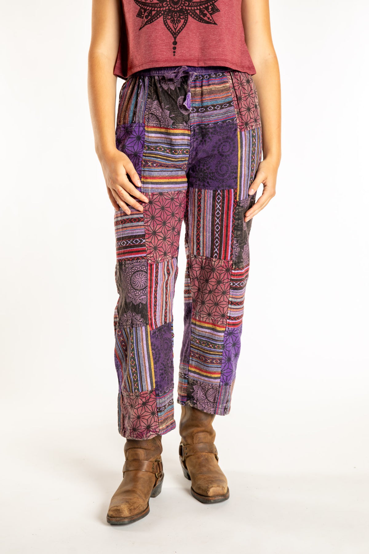 Emily is wearing the Purple Patchwork Stone Wash Meditation Pants in Small