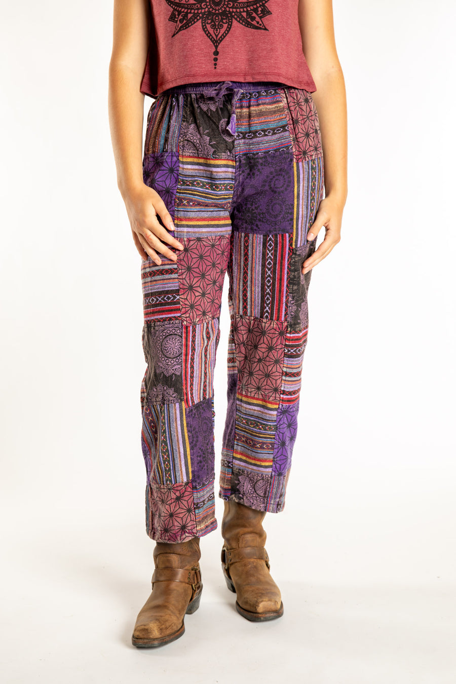 Emily is wearing the Purple Patchwork Stone Wash Meditation Pants in Small