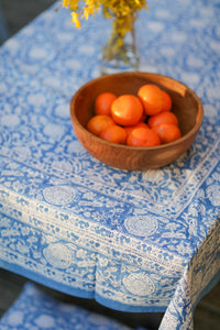 Bohemian block print tapestry in Blue Poppies, displayed as a tablecloth