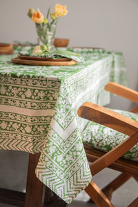 Bohemian block print tapestry in Forest Peonies, displayed as a tablecloth