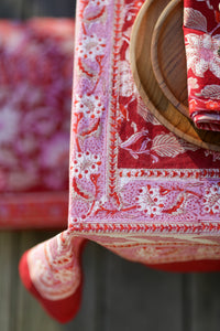 Bohemian block print tapestry in Garnet Profusion, displayed as a tablecloth